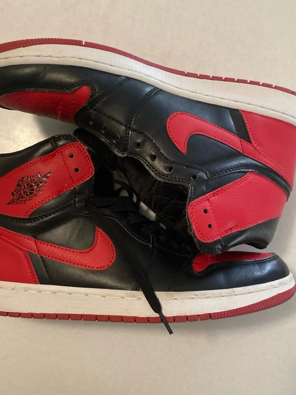 Jordan High-Top Sneakers in Black and Red